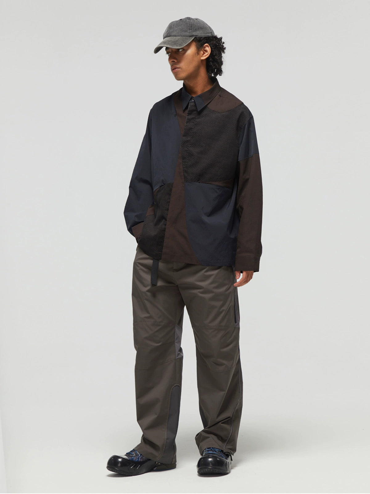 DECESOLO Multi-material paneled jacket