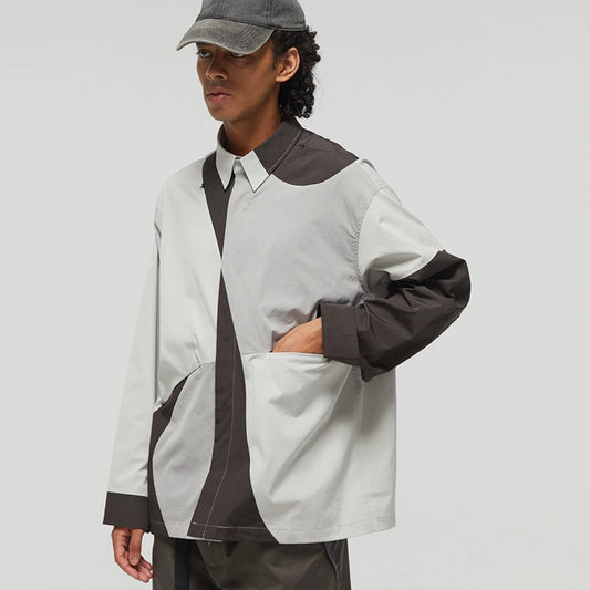 DECESOLO Multi-material paneled jacket
