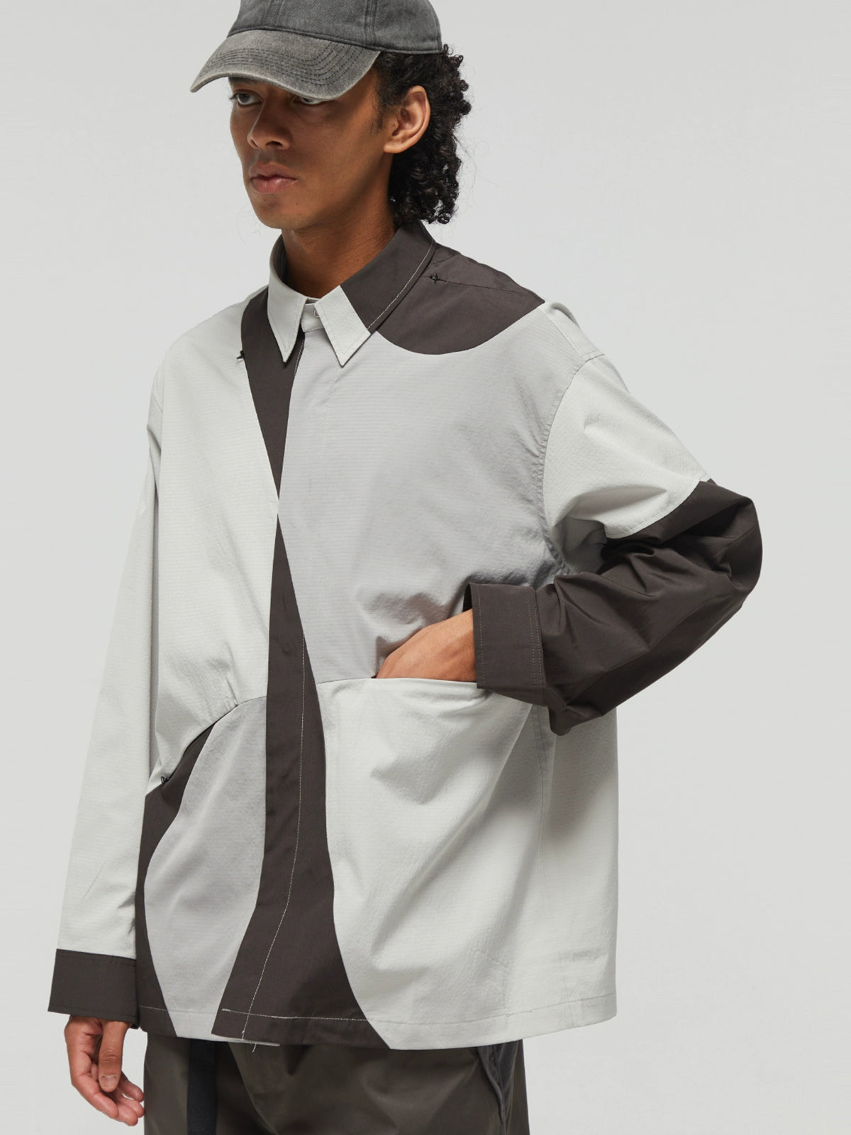 DECESOLO Multi-material paneled jacket