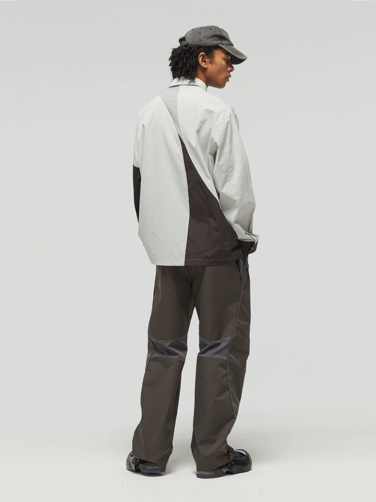 DECESOLO Multi-material paneled jacket